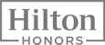 The image shows the Hilton Honors logo with "Hilton" above "Honors" in bold text within a rectangular outline.